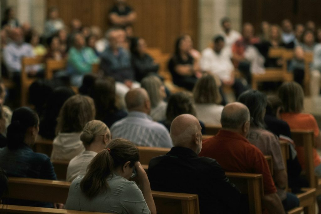 Audience seated in a church during a service.